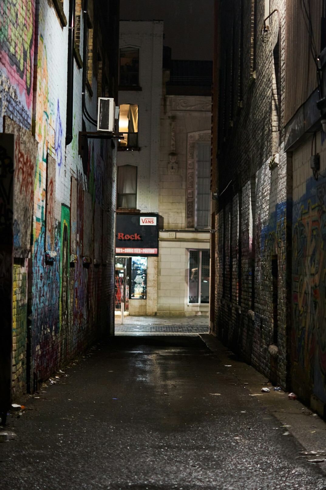 suspenseful dark alley at night